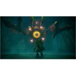 A brave character in green armor faces a massive, yellow-eyed mechanical creature with glowing pink triangles on its sides in a dark, misty cavern.